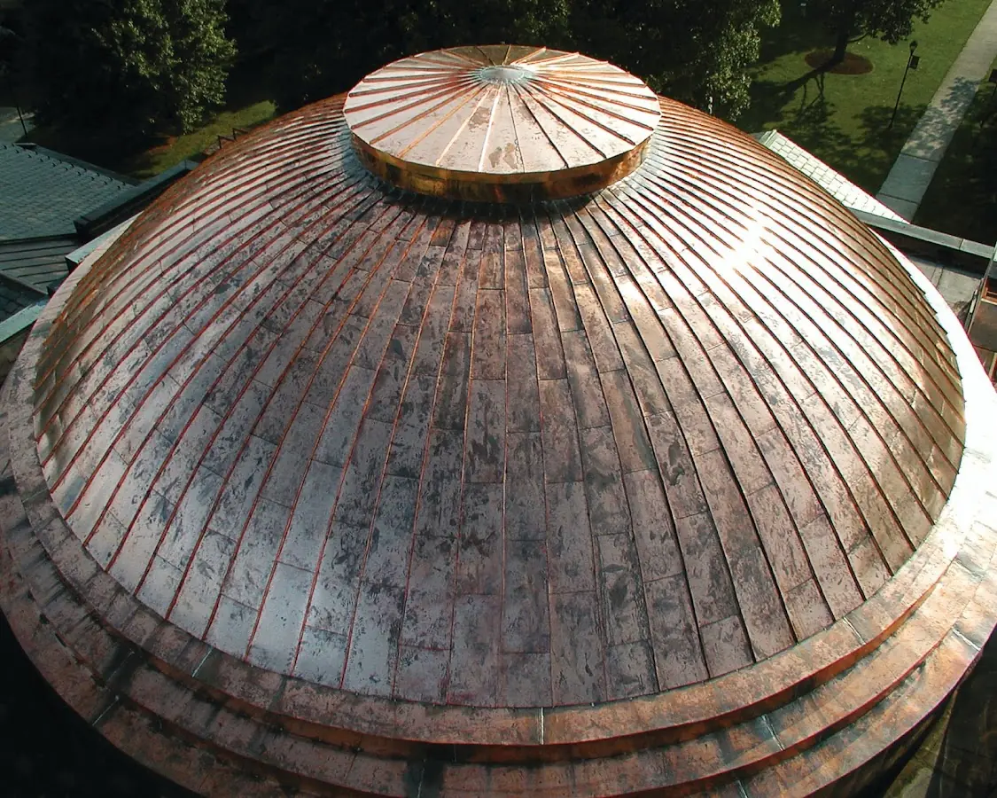 Craftsman Roofing crew installing a new roof in Gromore